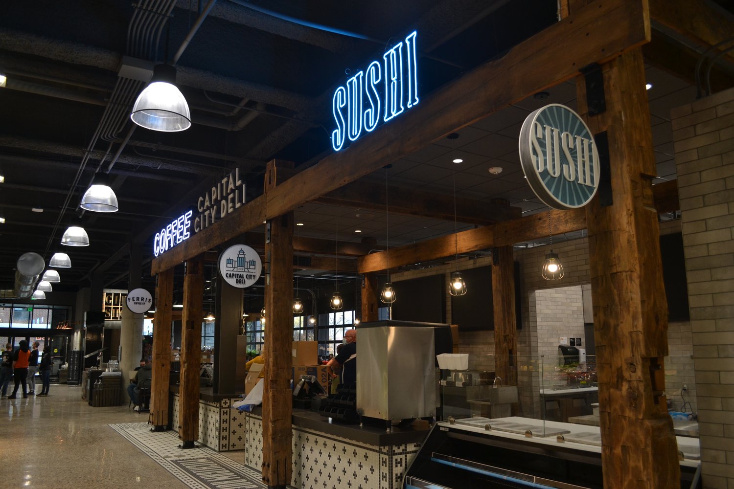 The Capital City Market café includes a sushi bar, deli and a coffee shop.