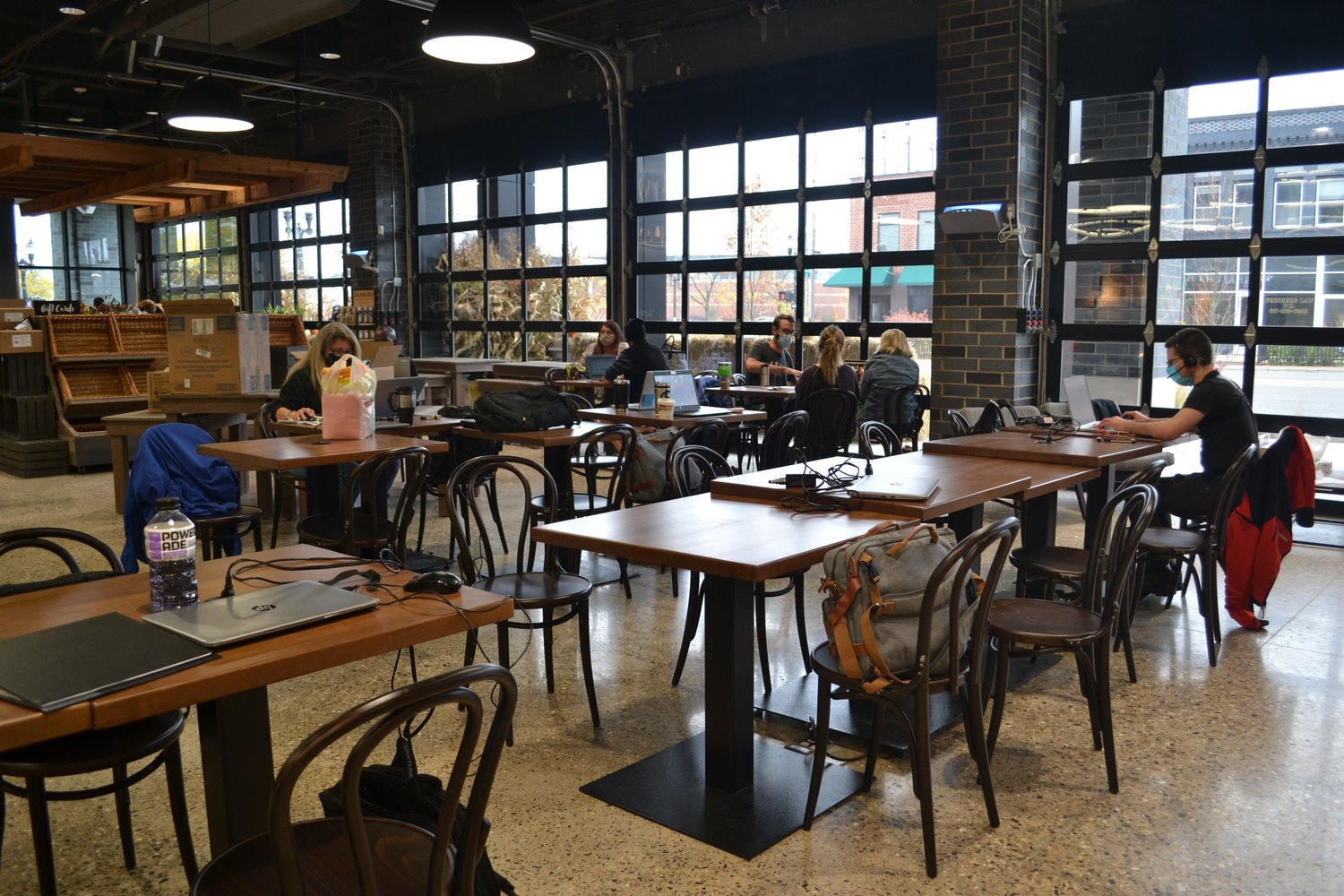 Cafe seating at the Capital City Market. Six garage-style doors will open when the weather permits.